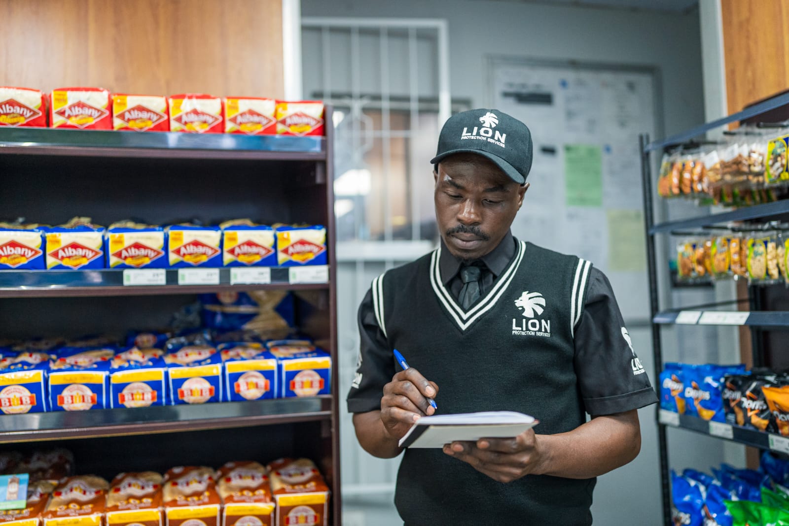 Officer conducting in-store retail security checks